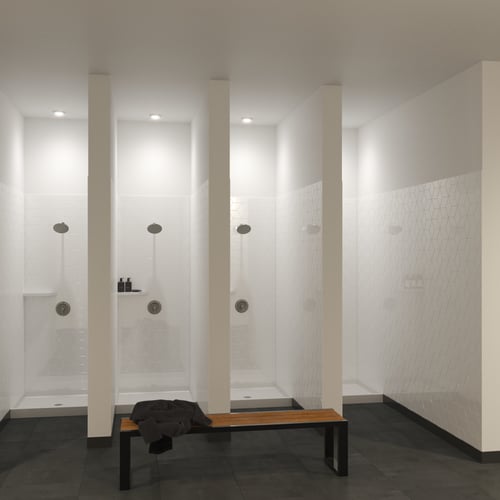 Groutless Mincey cast marble shower unit designed for extreme vandal resistance in university housing